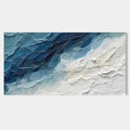 Textured blue and white abstract ocean canvas art close-up.
