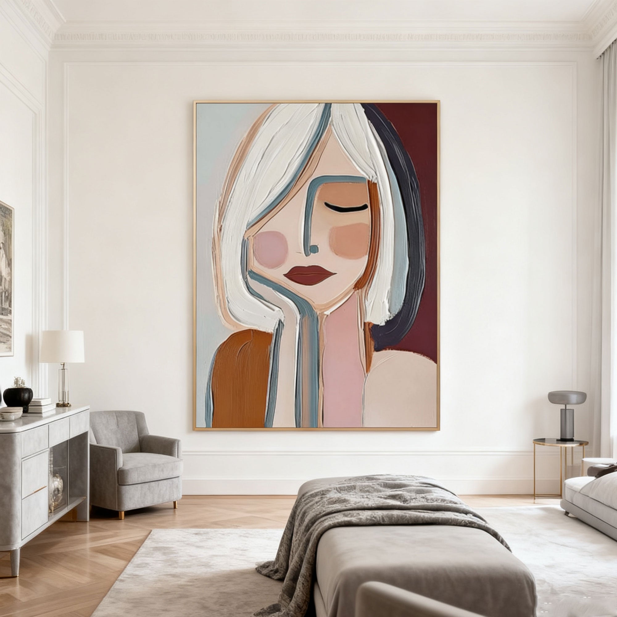 Authentic hand-painted modern abstract portrait 'Inner Pause' featuring a serene woman with closed eyes, textured brushstrokes in white, blue, brown, pink, deep red background, gold frame, displayed in a stylish bedroom.