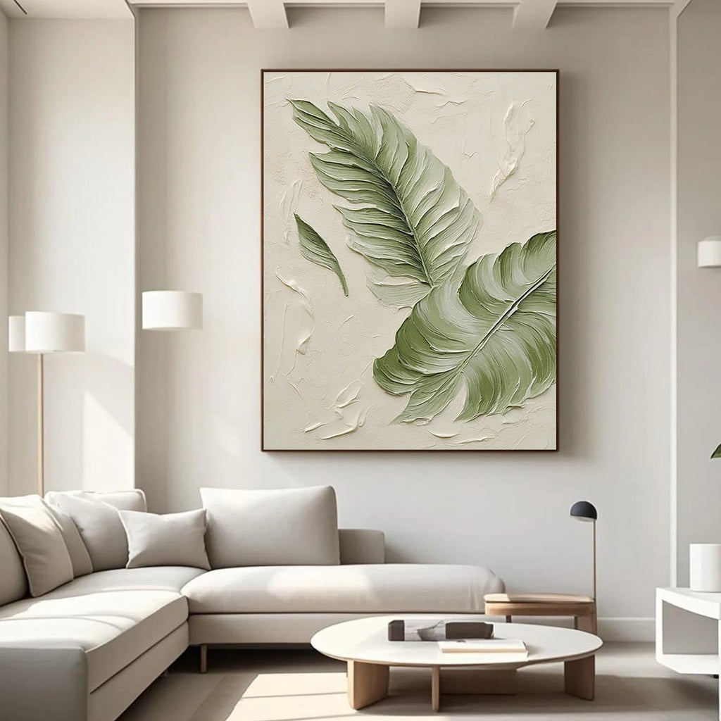 Modern minimalist botanical canvas art with textured banana leaves, framed, in contemporary living room