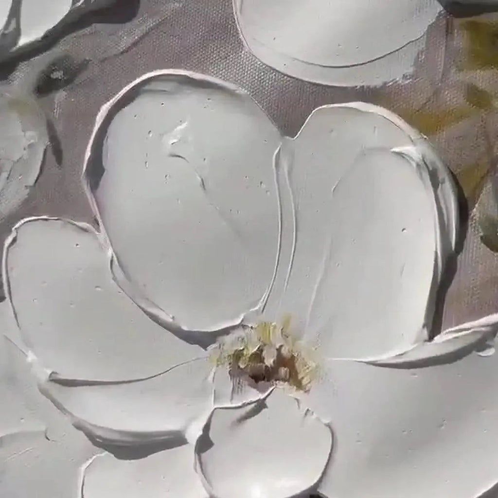 Impasto texture of the white floral blossoms on the canvas art.
