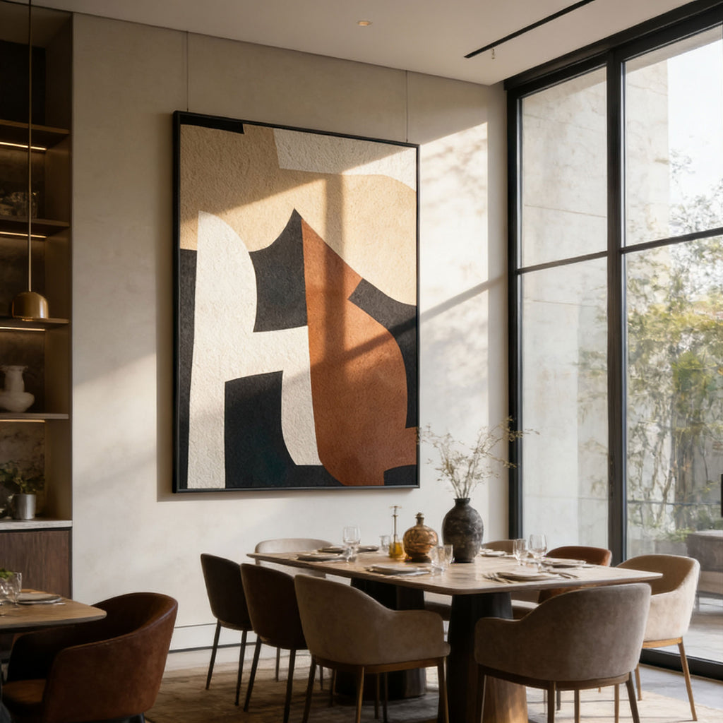 Modern dining room with abstract art on the wall and large windows.