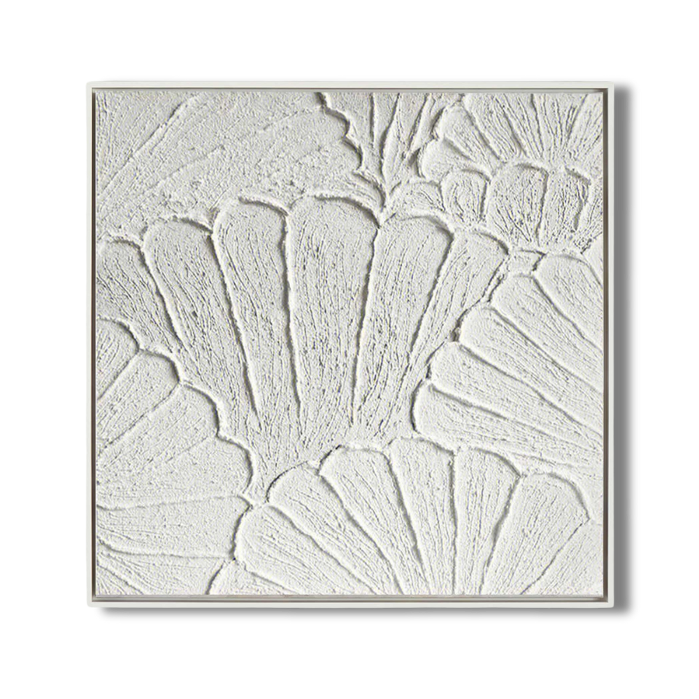 Close-up of white plaster art texture painting in a square frame.