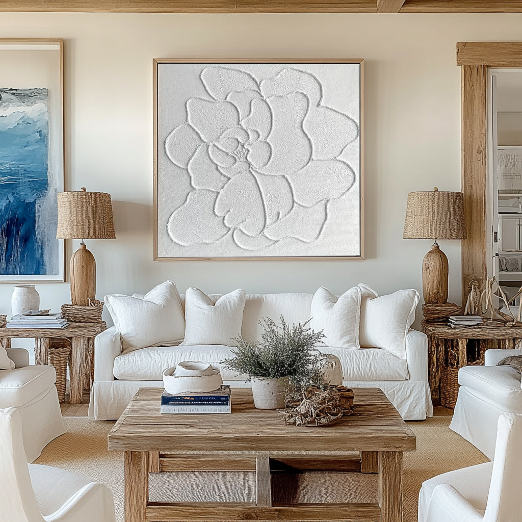 Living room featuring a white plaster art texture painting over a sofa.