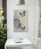 Modern butterfly abstract painting featuring blue and white butterflies fluttering on a soft beige and grey background, ideal for nature-themed decor.