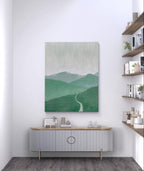 Green minimalist mountain landscape painting featuring a winding path and layered mountains, with soft green and grey tones, ideal for modern decor.