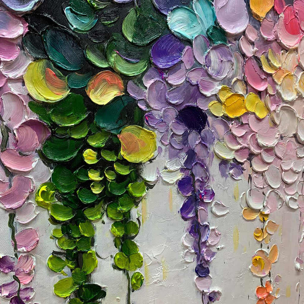 Hand-painted colorful abstract floral painting with textured impasto petals in pink, yellow, green, and purple, on a horizontal canvas for bright modern interiors.