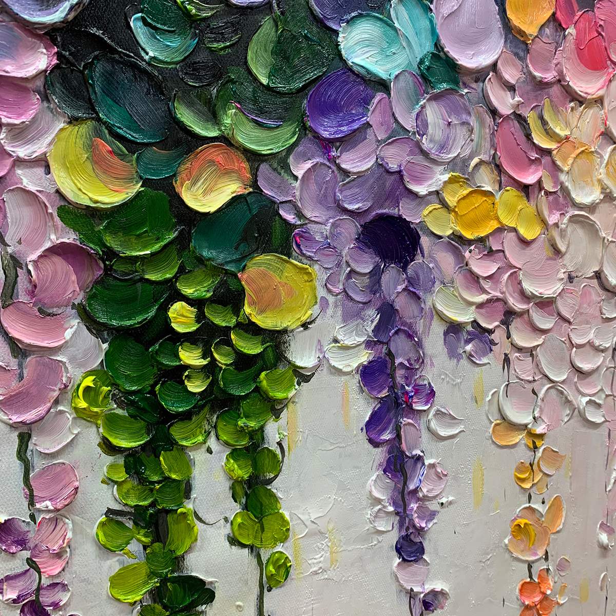 Hand-painted colorful abstract floral painting with textured impasto petals in pink, yellow, green, and purple, on a horizontal canvas for bright modern interiors.
