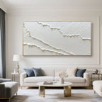 Textured abstract 'Drift' art with gold frame in elegant living space.