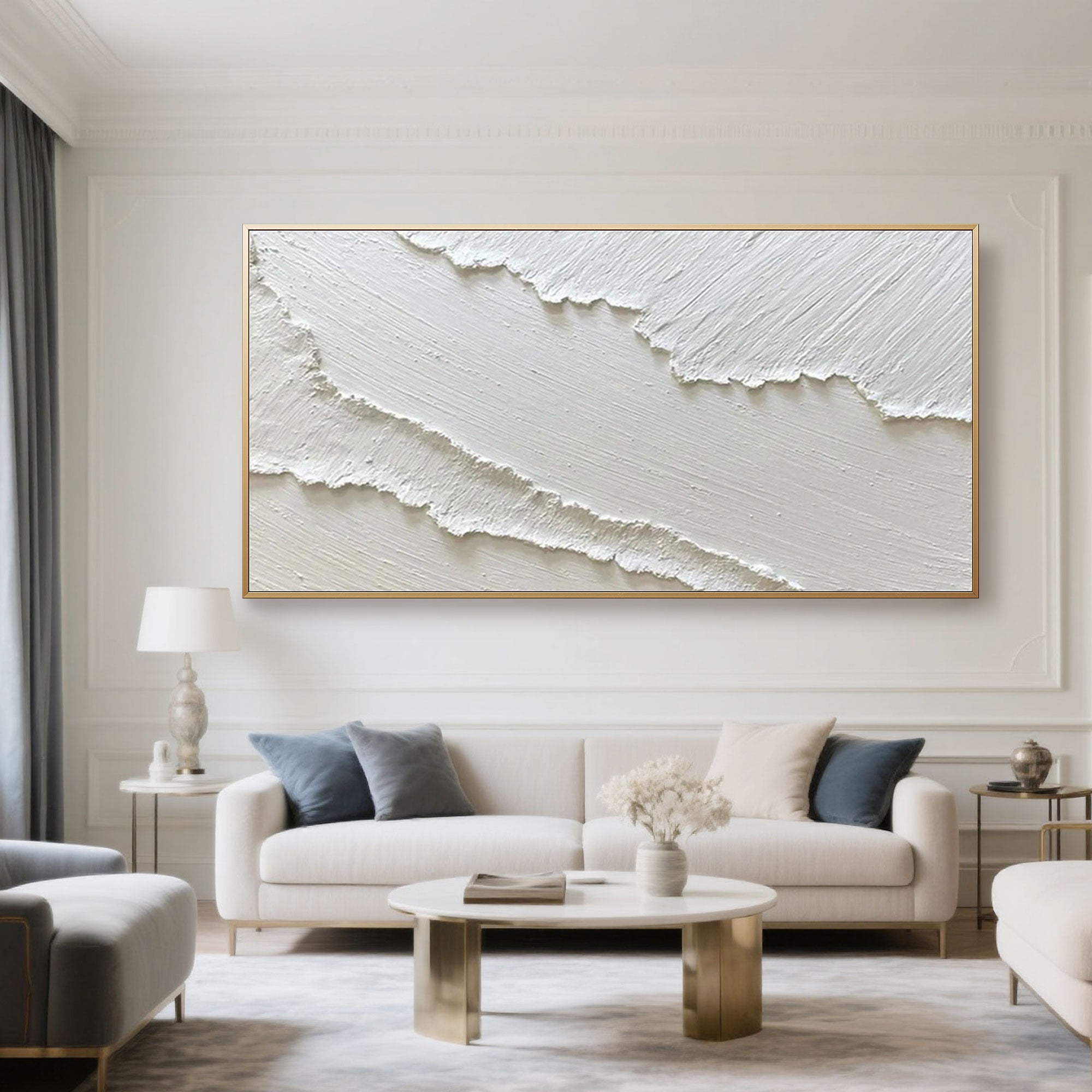 Textured abstract 'Drift' art with gold frame in elegant living space.
