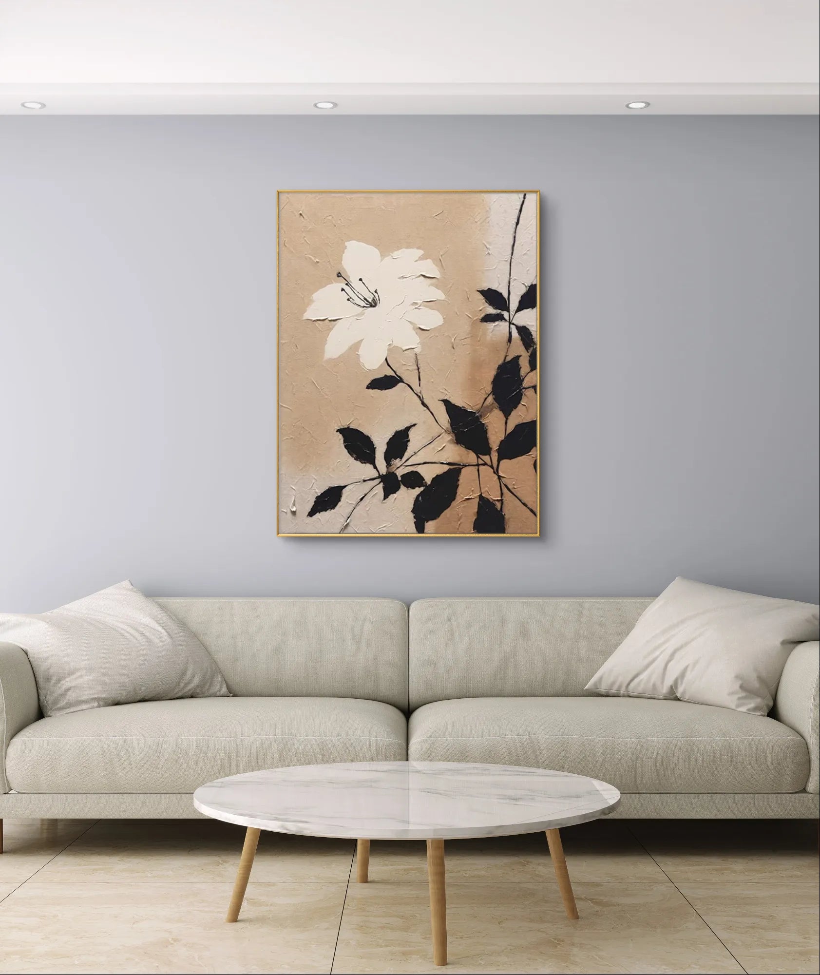 Textured beige floral wall art with a white flower and black leaves on canvas