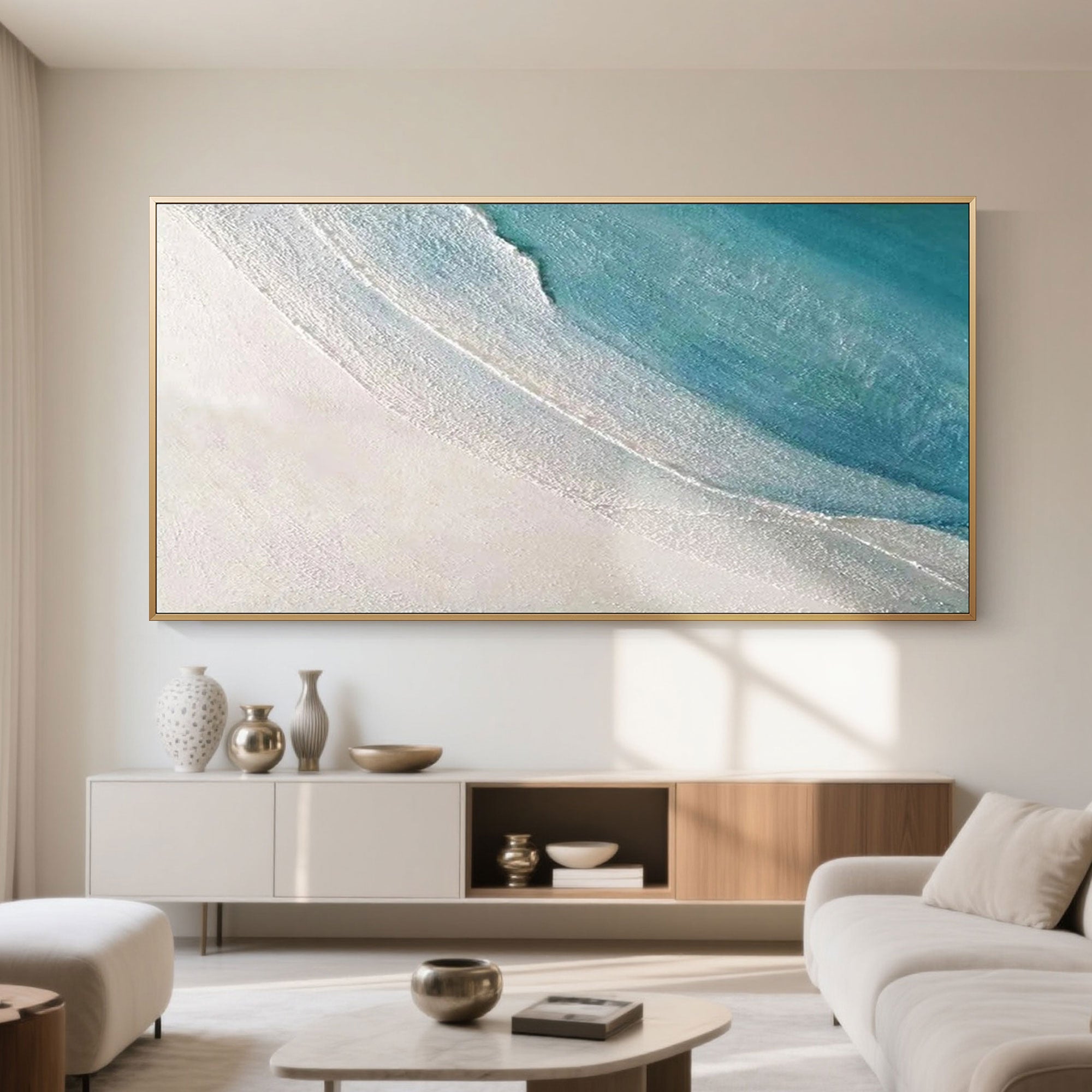 Coastal shimmer wall art 'Drift' with a gold frame in a styled interior.