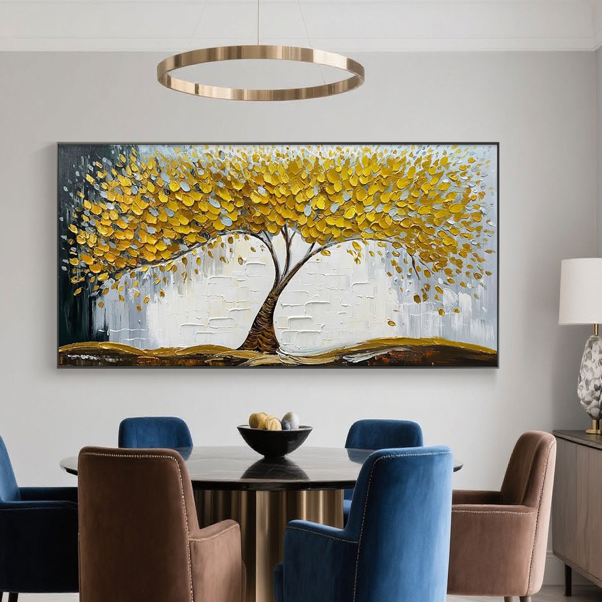 Modern living room featuring a gold leaf symmetrical tree canvas art piece.