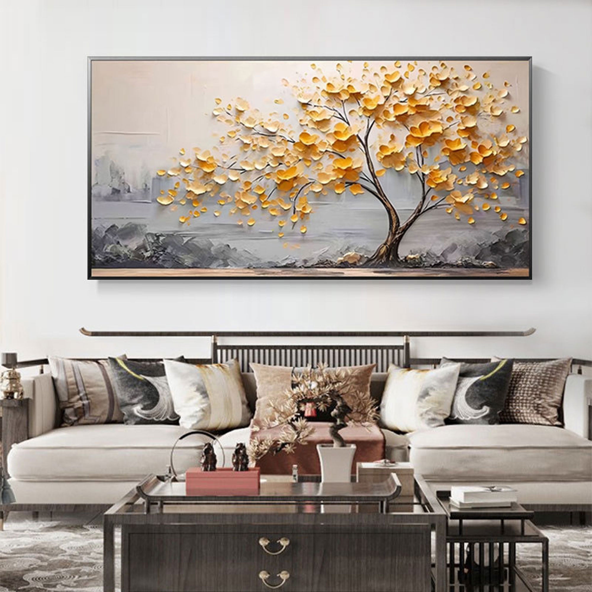 Modern living room with a textured gold abstract tree painting above the sofa.