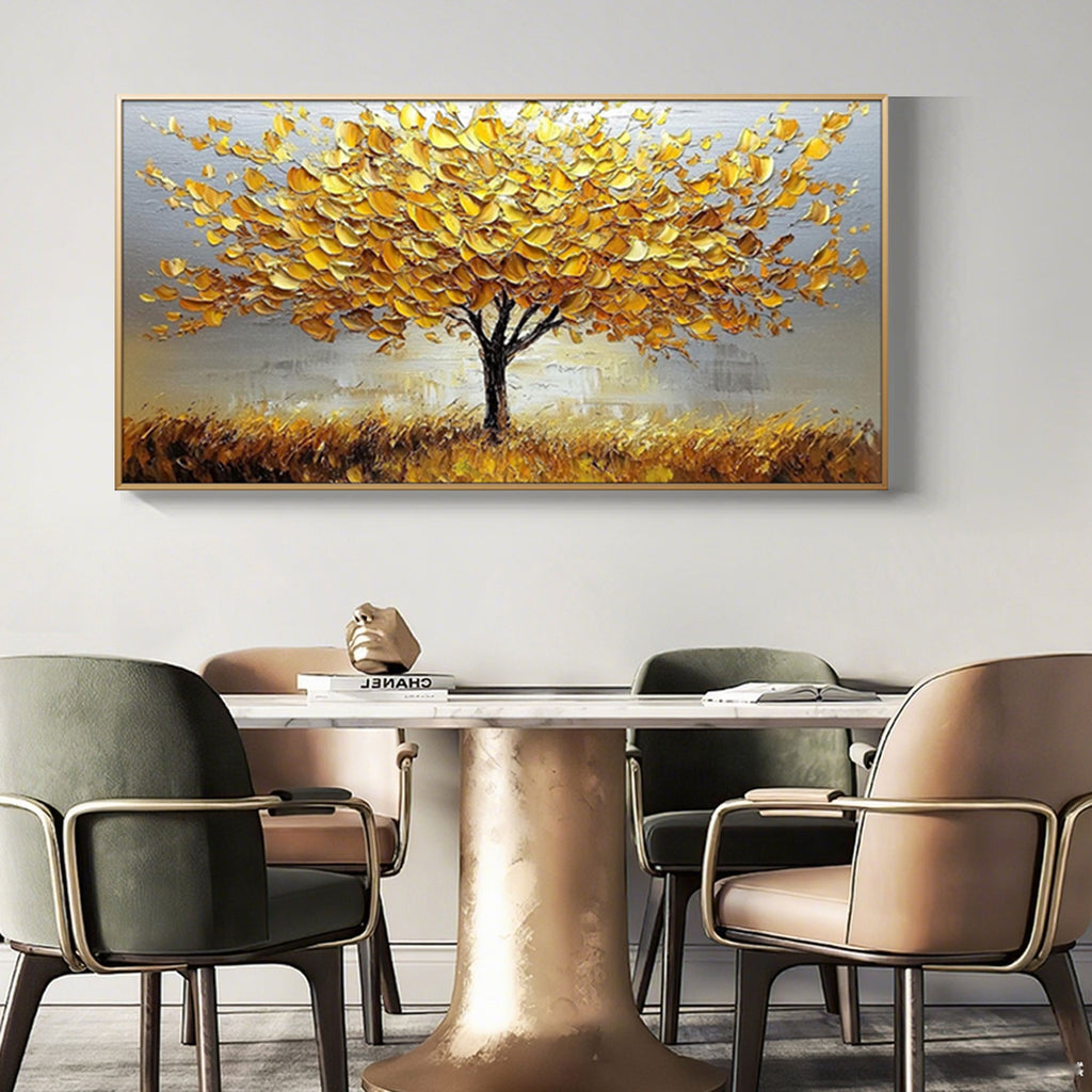Abstract gold tree art framed over dining table.