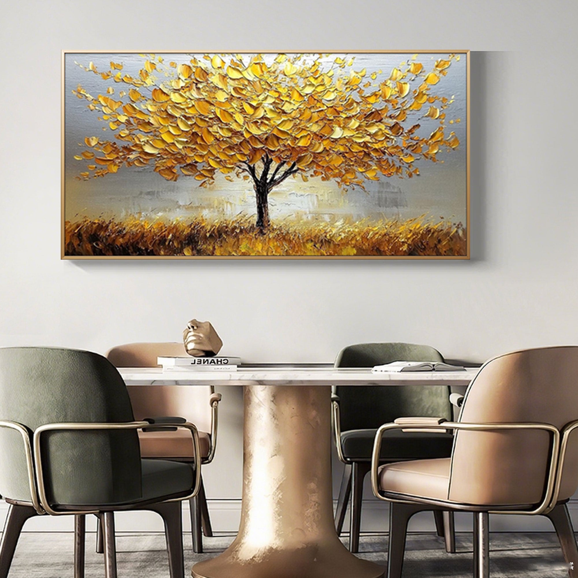 Abstract gold tree art framed over dining table.