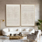 Minimalist geometric canvas art 'Woven Silence' with neutral tones, gold frame, modern living room decor at Lumi Gallery