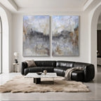 Two large vintage abstract minimalist canvas paintings 'Storm and Gold' in modern living room