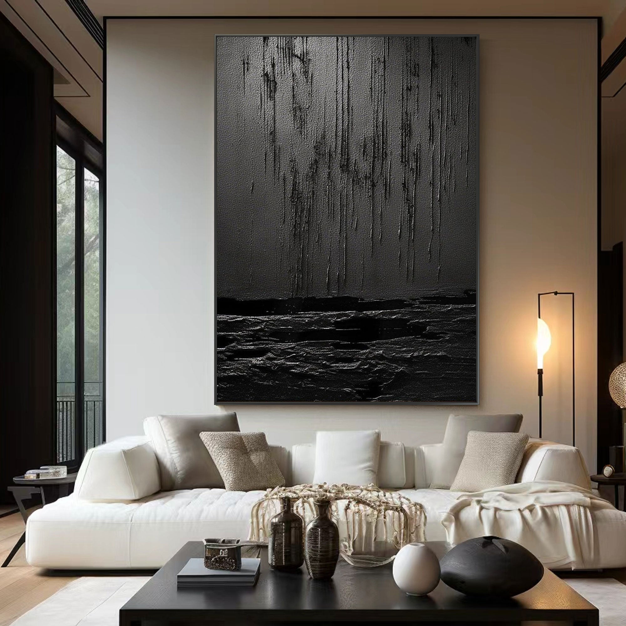 Wabi Sabi black textured art above a couch in a modern living room.