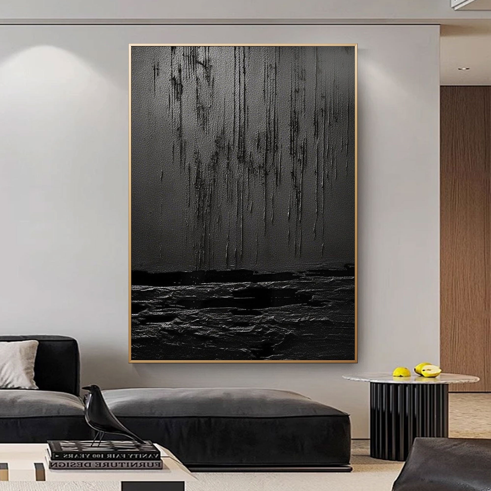 Wabi Sabi black textured art in a modern living room with gold frame. 