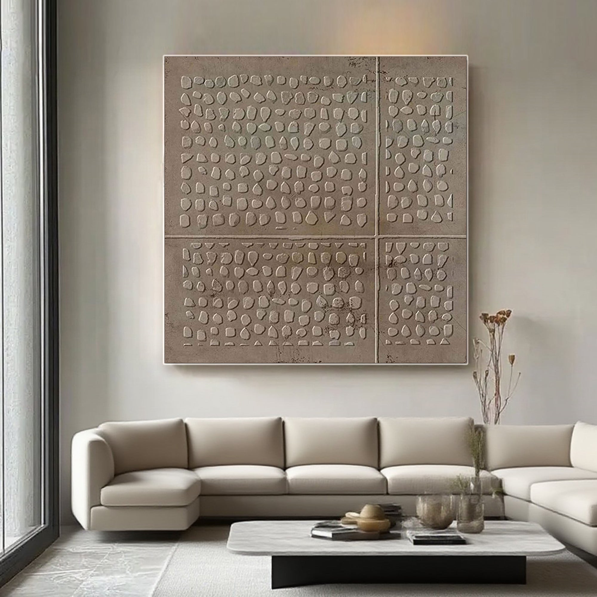 Wabi Sabi brown art above a couch, adding a touch of vintage charm to the living room.