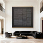 Lumi Gallery's wabi-sabi black hand-painted textured canvas with weathered grid, framed, modern living room