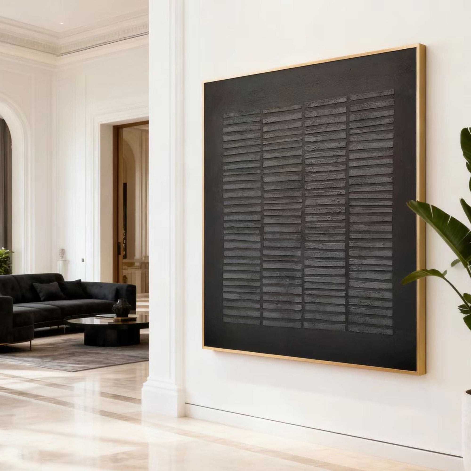 Wabi-Sabi geometric textured black painting with gold frame in modern living room