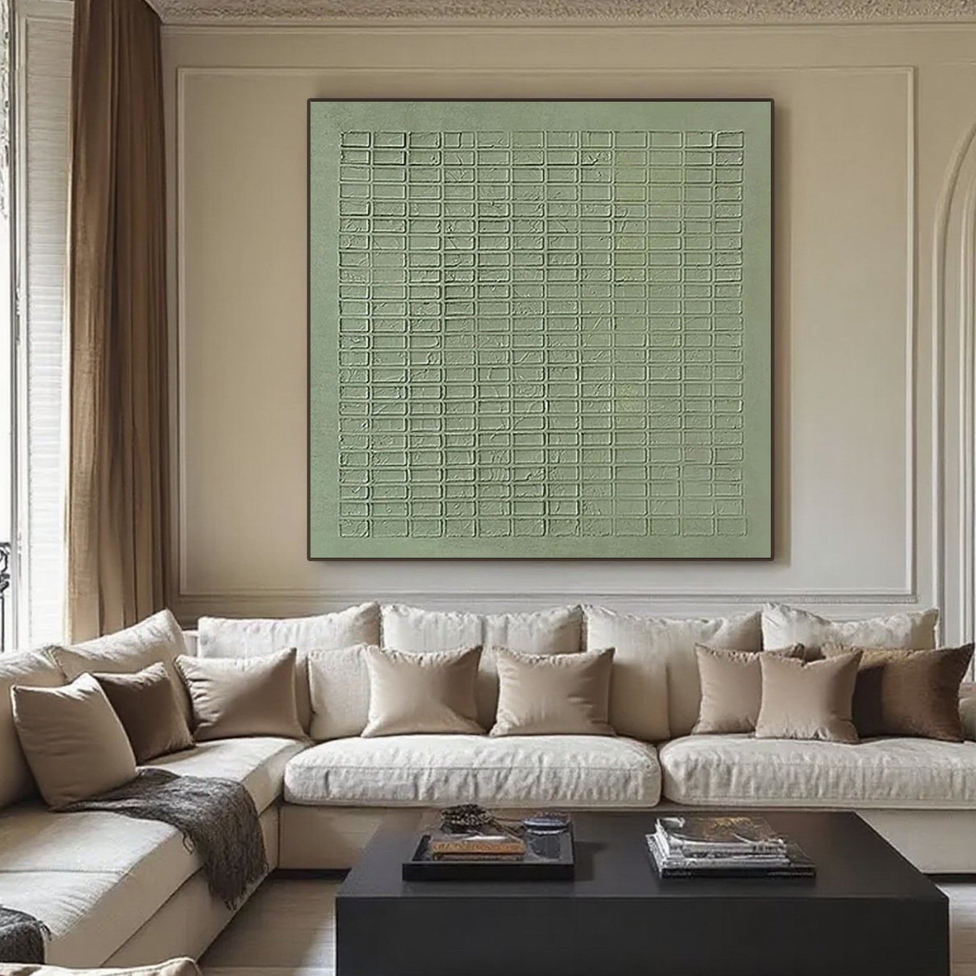 Green textured canvas art above a sofa in a neutral-toned living room.