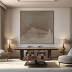 Wabi Sabi brown canvas art above dining table. Textured sun and mountain shapes.
