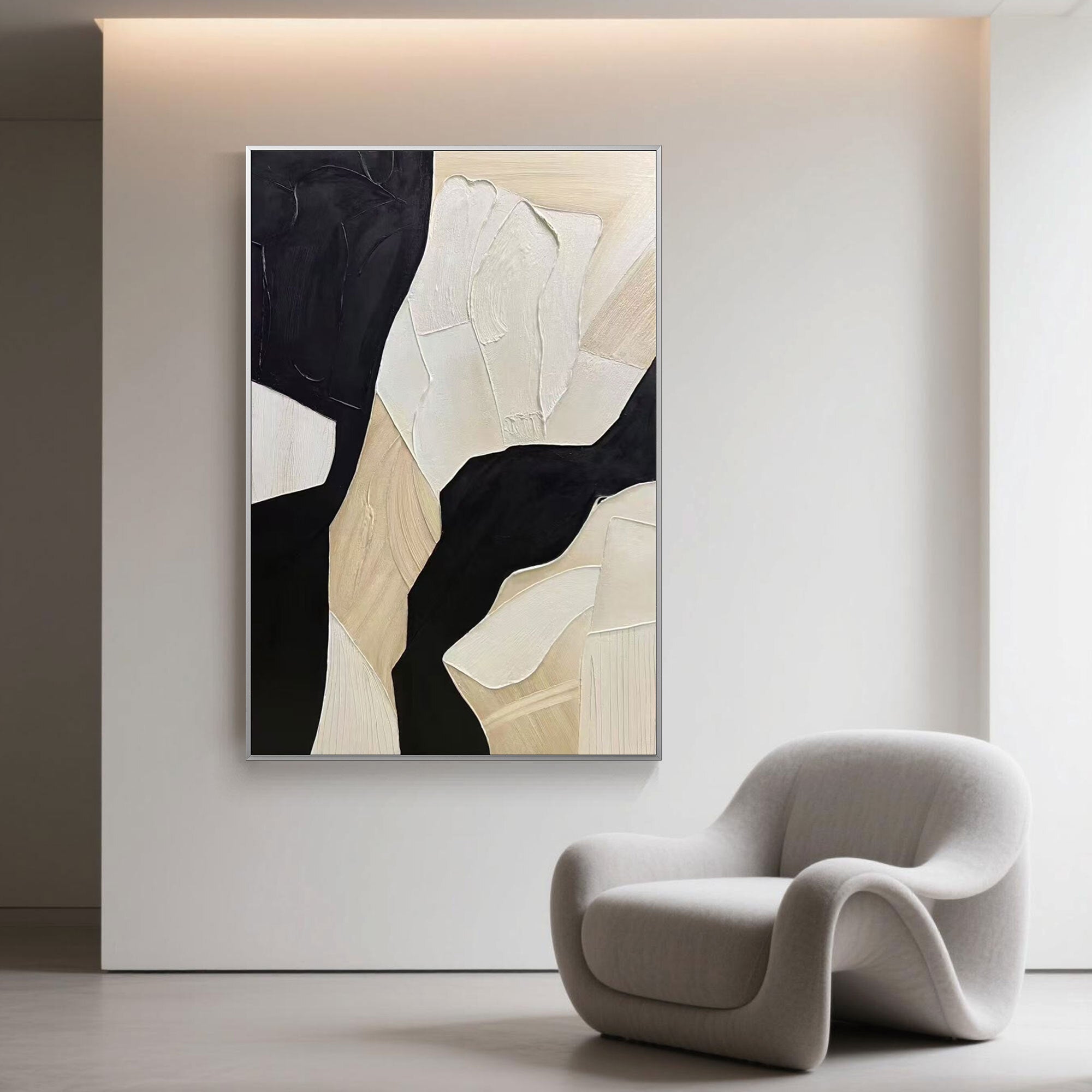 Vertical abstract geometric painting decorates a serene modern room with soft lighting and a sculptural grey accent chair.