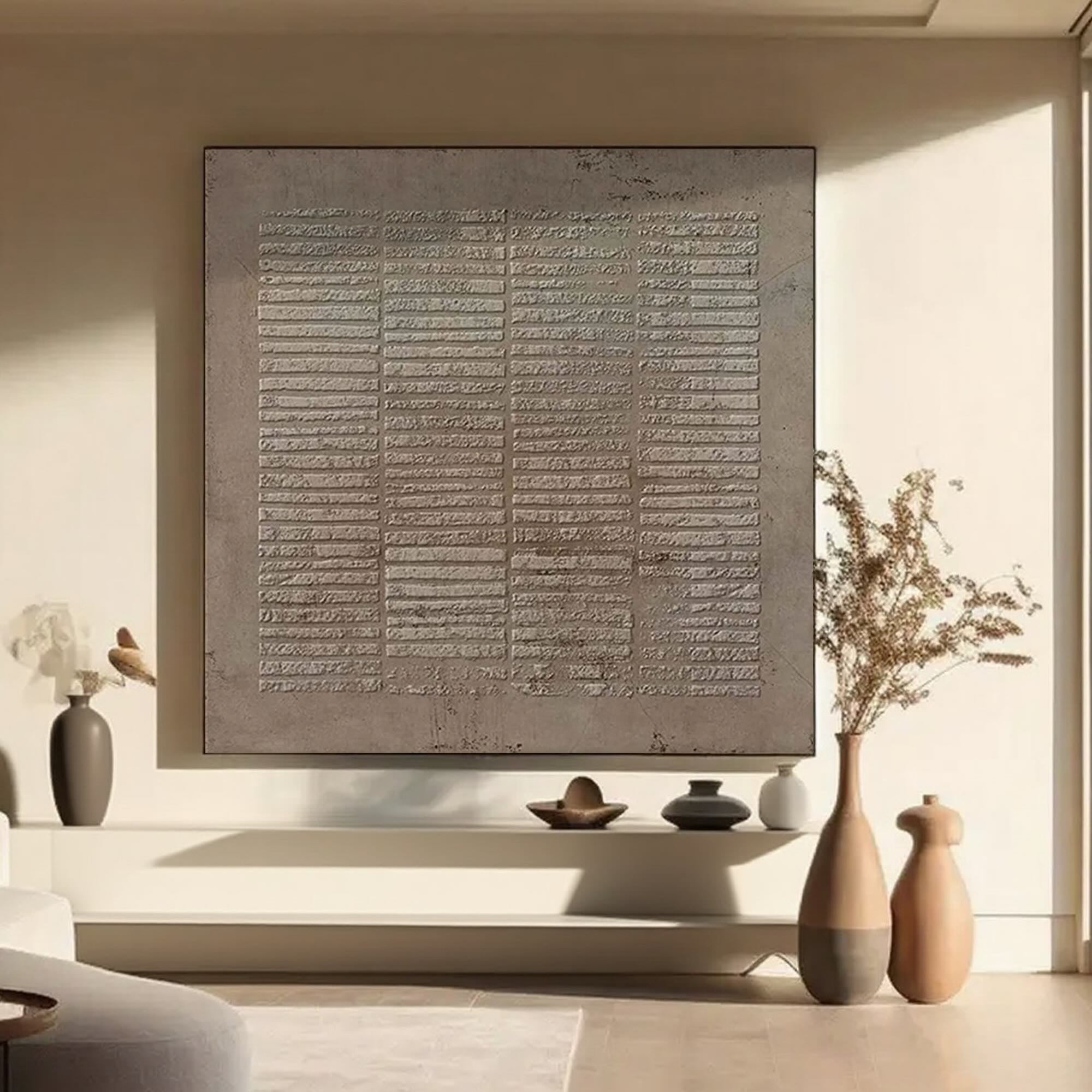 Wabi Sabi square canvas art in sediment color in a living room setting.