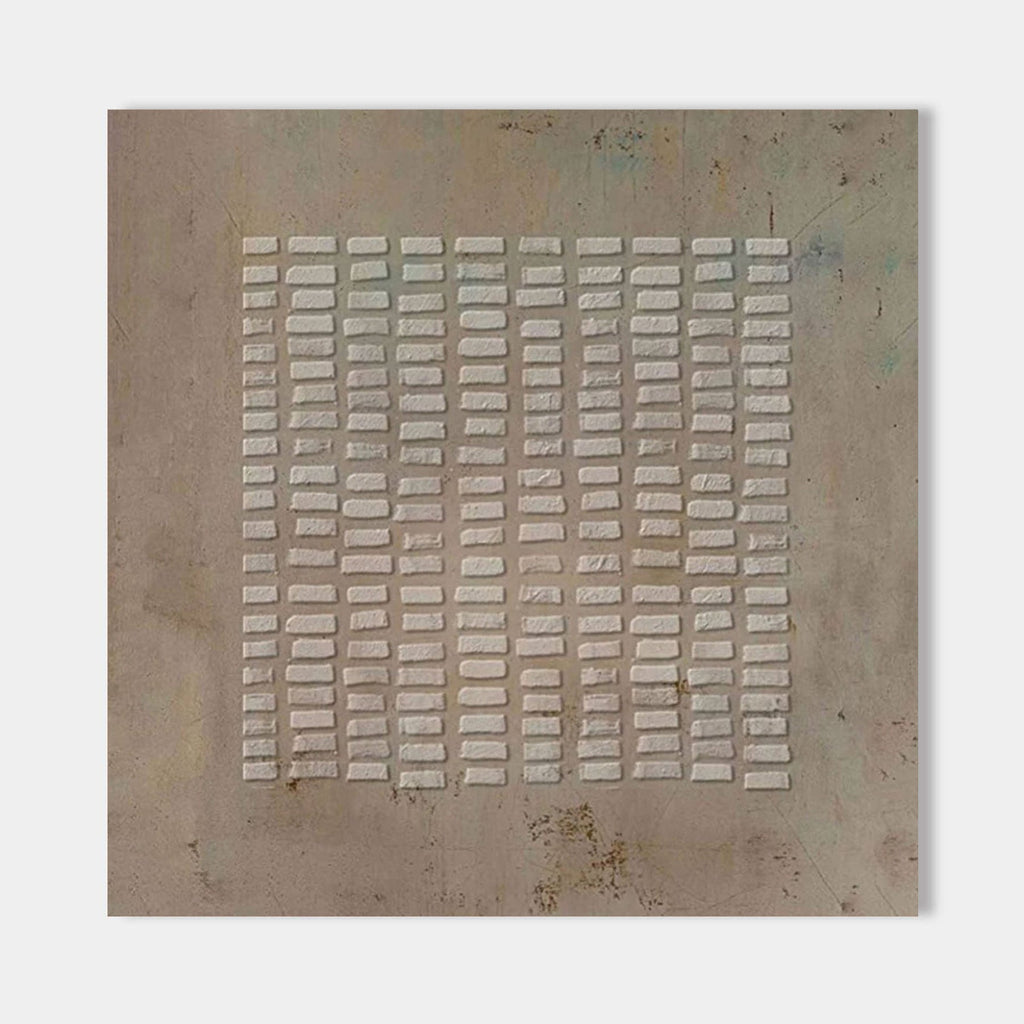 Close-up of textured brown wabi-sabi canvas art with layered rectangular patterns.