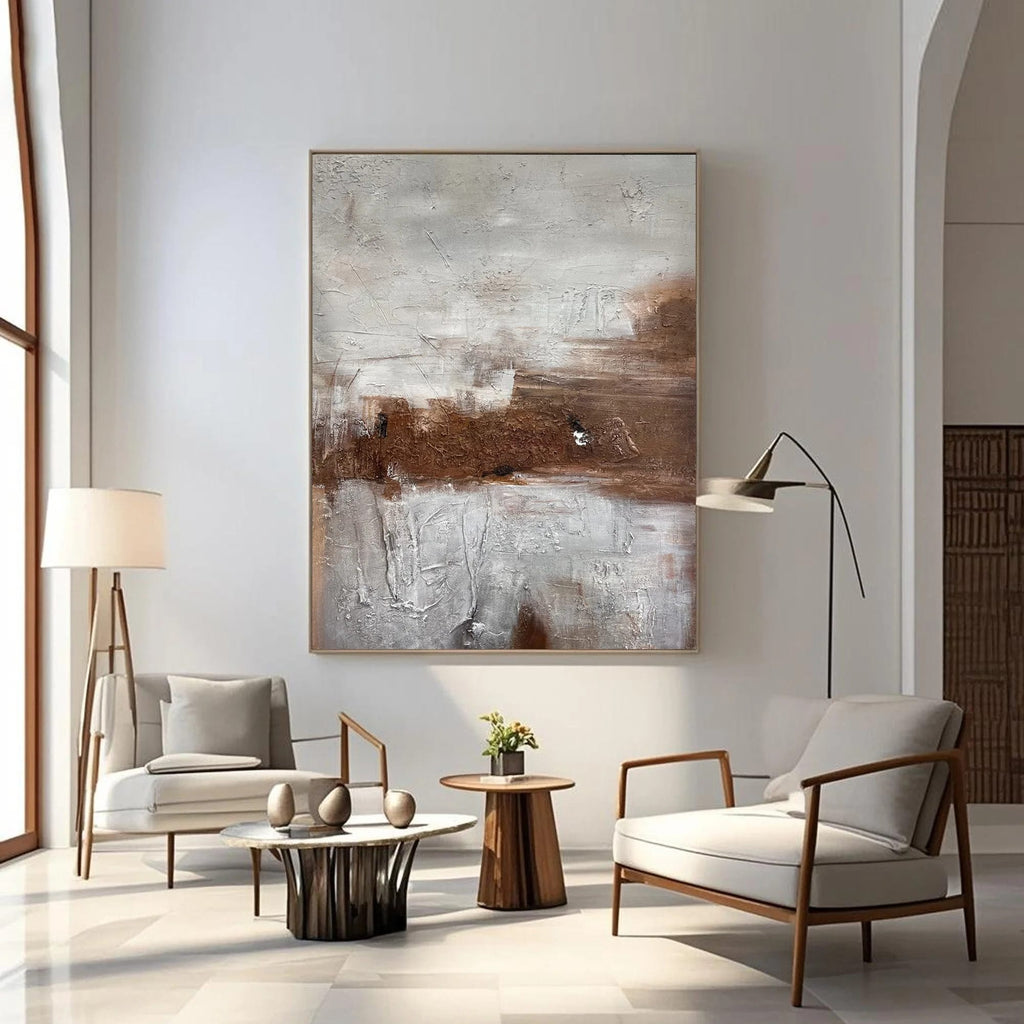 Lumi Gallery's hand-painted abstract wall art 'Fading Earth' with earthy browns/grays in modern living room