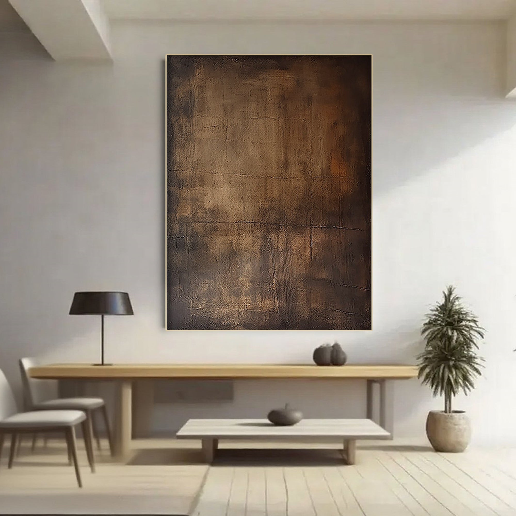 Wabi-Sabi Brown Abstract Wall Art 'Ancient Light' hand-painted with textured details in earthy brown tones, displayed in a modern living room with a console table, lamp, and potted plant.
