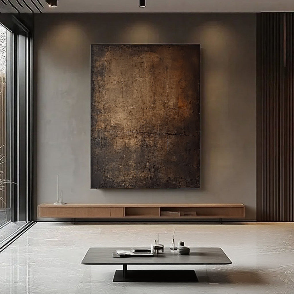 Hand-painted Wabi-Sabi brown abstract canvas wall art with textured earthy tones, displayed in a modern living room with minimalist furniture.