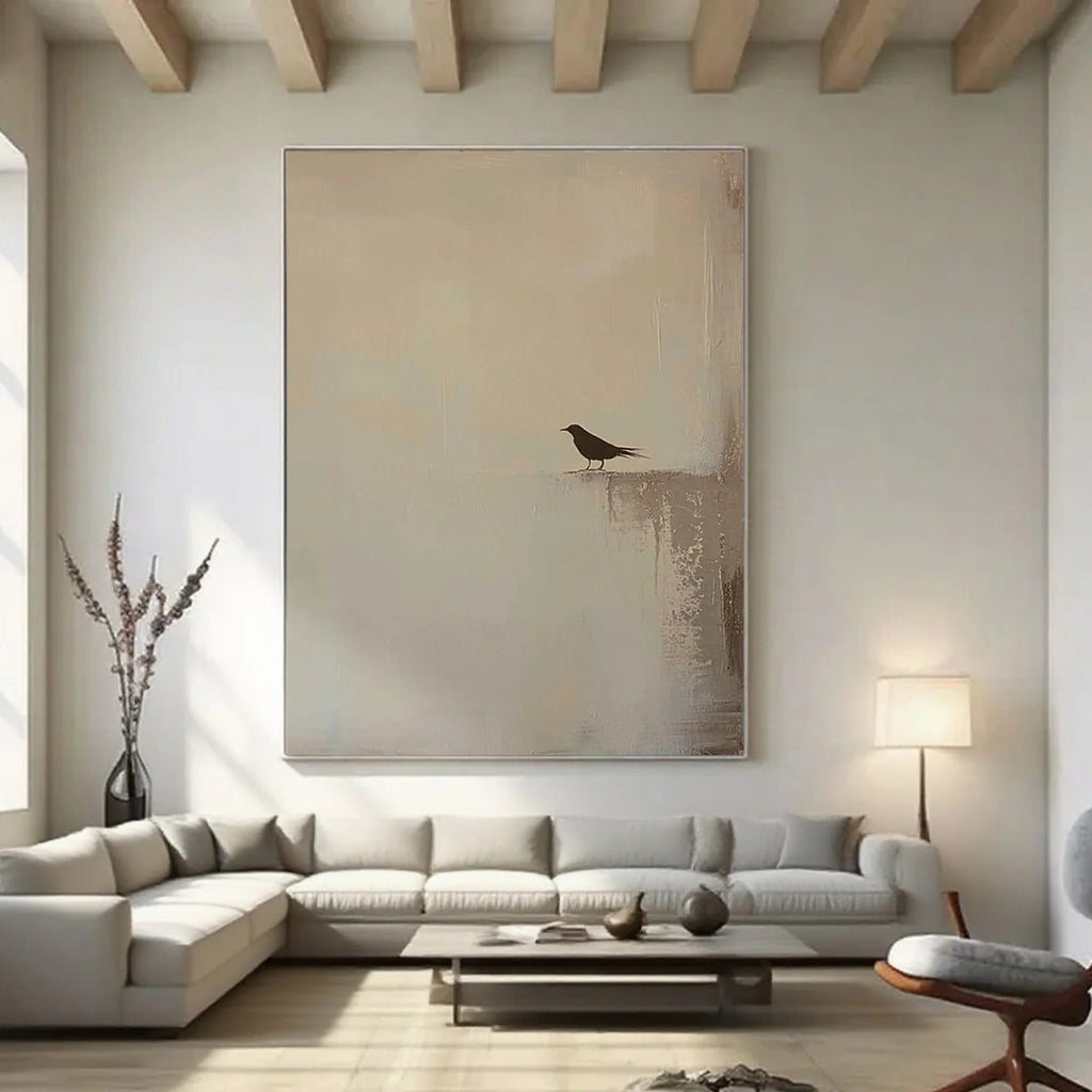 Zen minimalist hand-painted wall art with lone bird silhouette on neutral canvas in modern living room