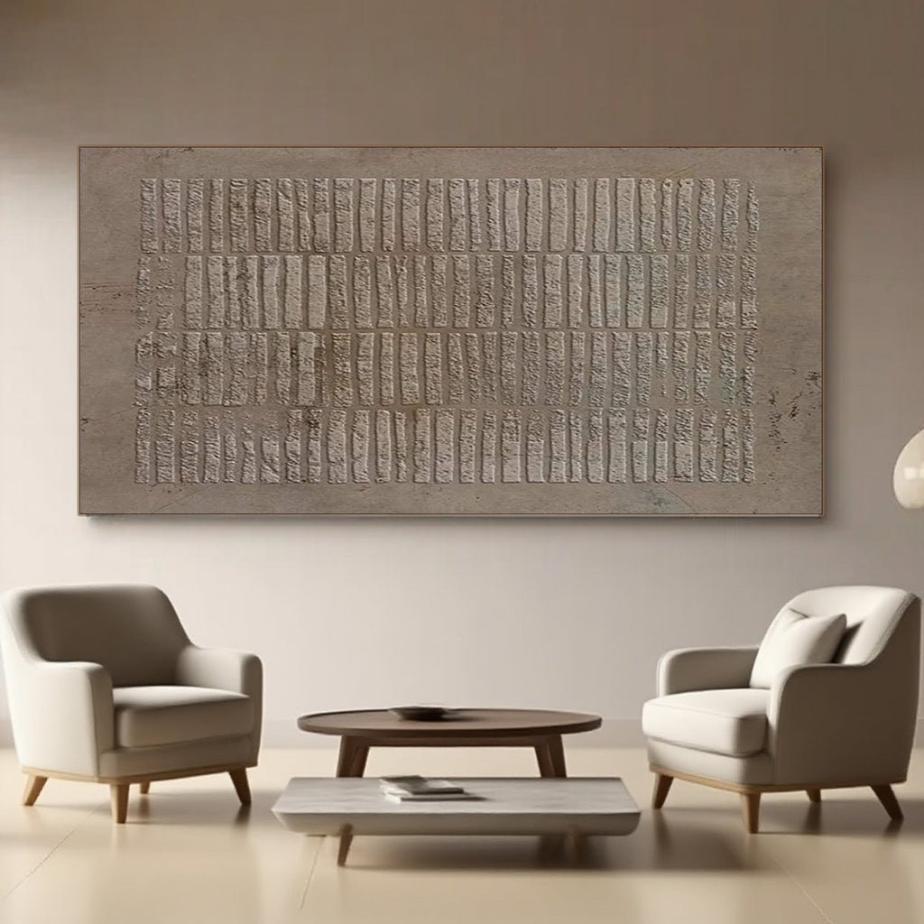 Wabi Sabi brown textured wall art displayed in a living room setting with armchairs.