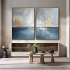Large vertical blue gold seascape wall art set displayed in a modern living room