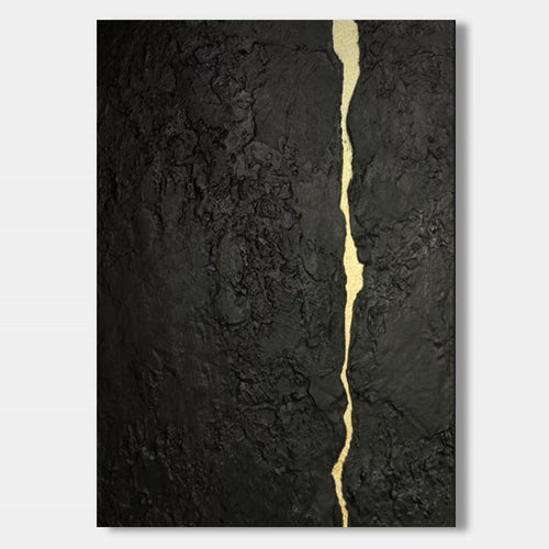 Abstract minimalist black textured canvas featuring a flowing gold kintsugi vein, hand-painted wall art for contemporary interiors.