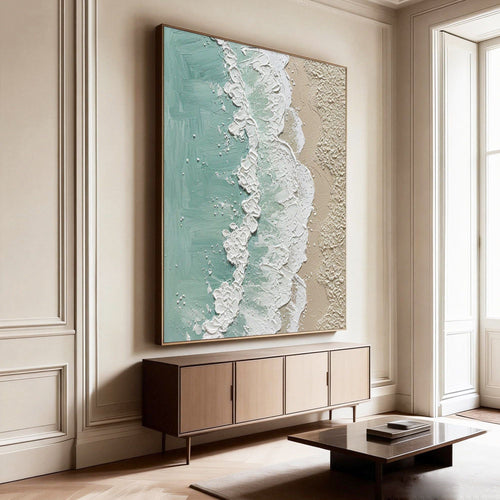 3D textured minimalist coastal wall art with aqua and beige tones, mounted above modern cabinet in elegant living room
