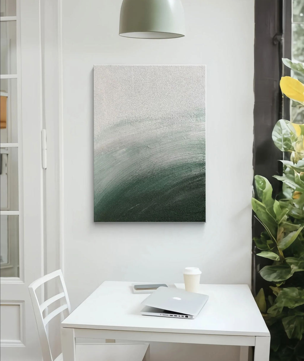 Minimalist painting in a bright, modern dining area.