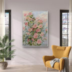 Impressionistic floral painting depicting pink and light yellow roses, complemented by green leaves, creating a fresh and natural ambiance.