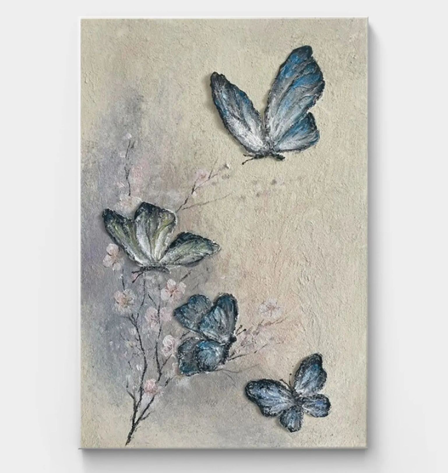 Modern butterfly abstract painting featuring blue and white butterflies fluttering on a soft beige and grey background, ideal for nature-themed decor.