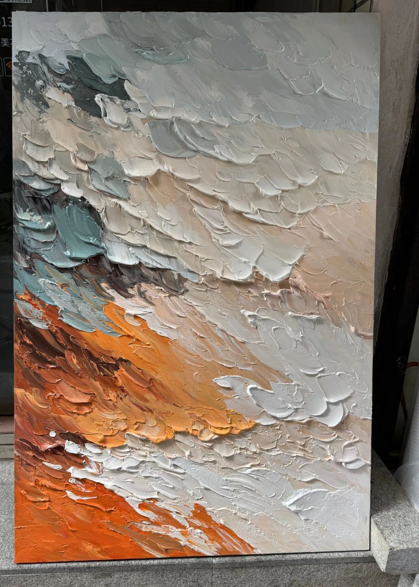 Close-up of textured impasto layers in 'Molten Light' canvas artwork.