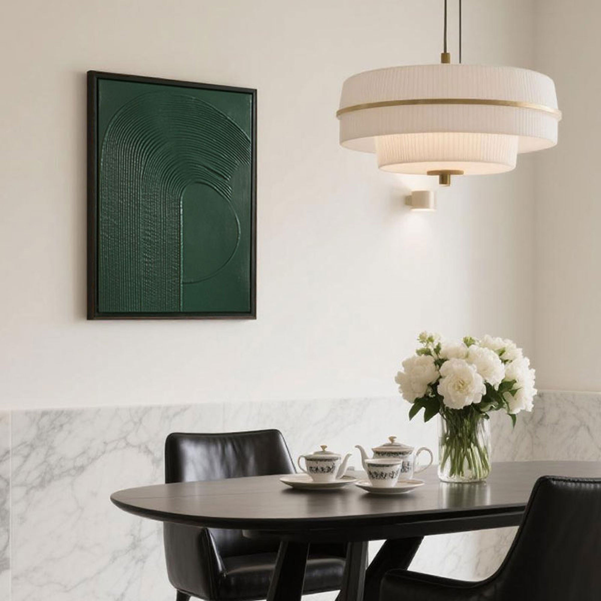 Vertical abstract green painting showcasing thick acrylic textures and minimalist geometric curves, mounted on a bright gallery wall with soft beige background and complementary decor pieces.