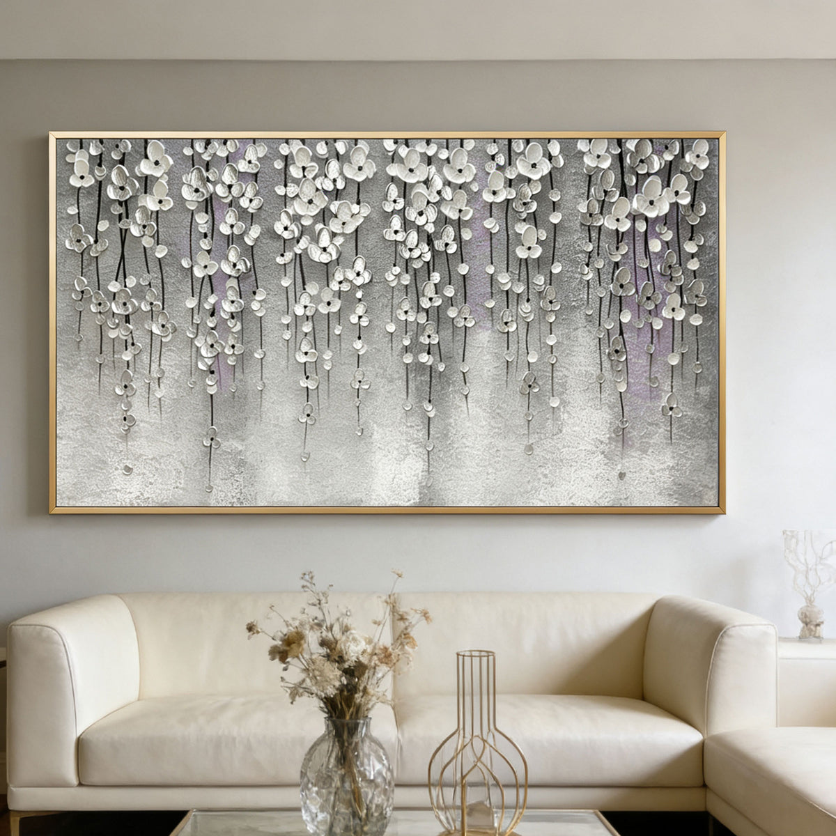 3D textured silver floral modern wall art with gold frame in contemporary living room at Lumi Gallery